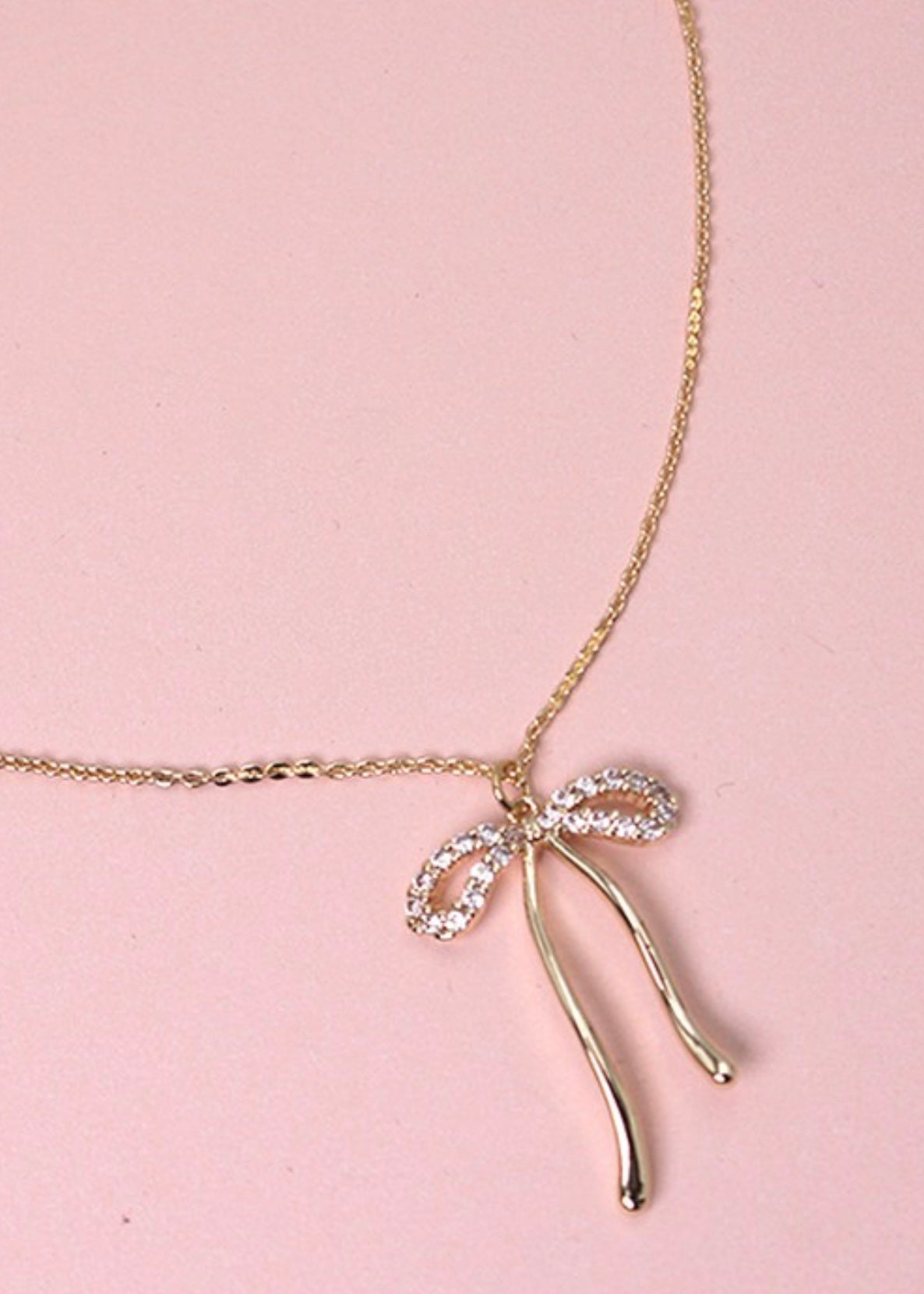 RHINESTONE BOW PENDANT NECKLACE